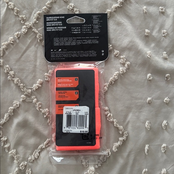 Unisex Nike Dri-FIT Wristbands in Bright Coral - Picture 2 of 2